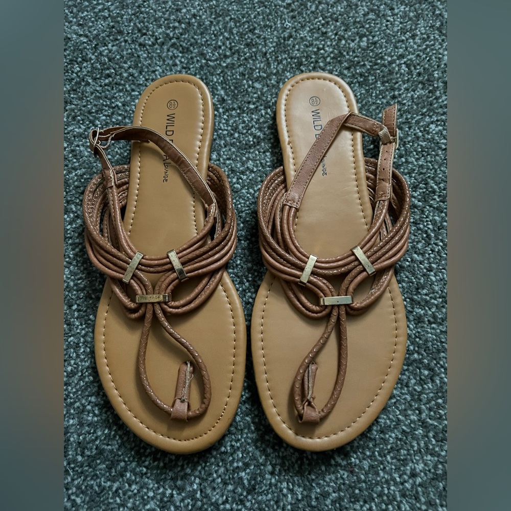 Brown flat sandals with gold detail